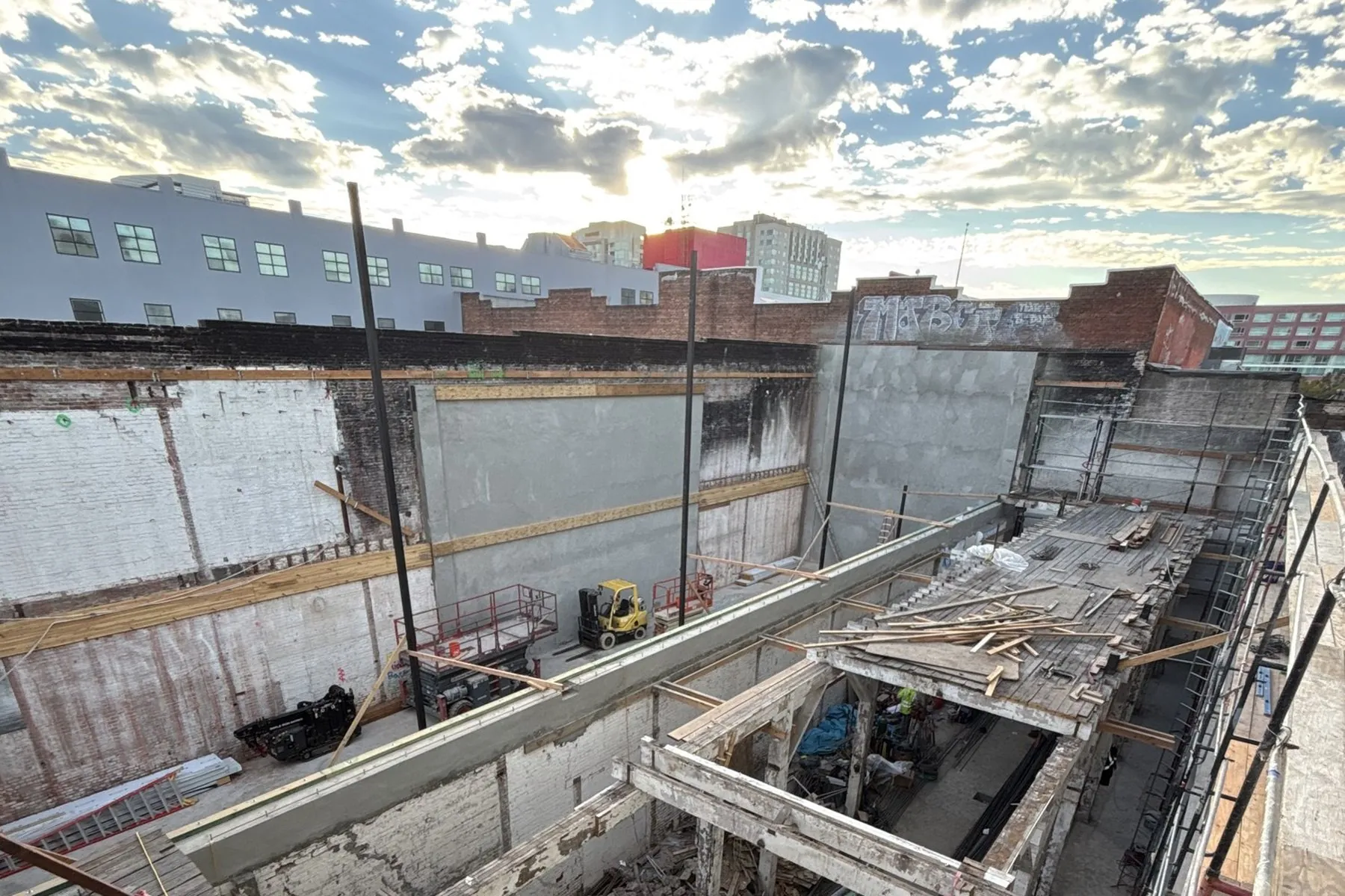 Bluxome St, SoMa: new structure rising inside the kept brick shell