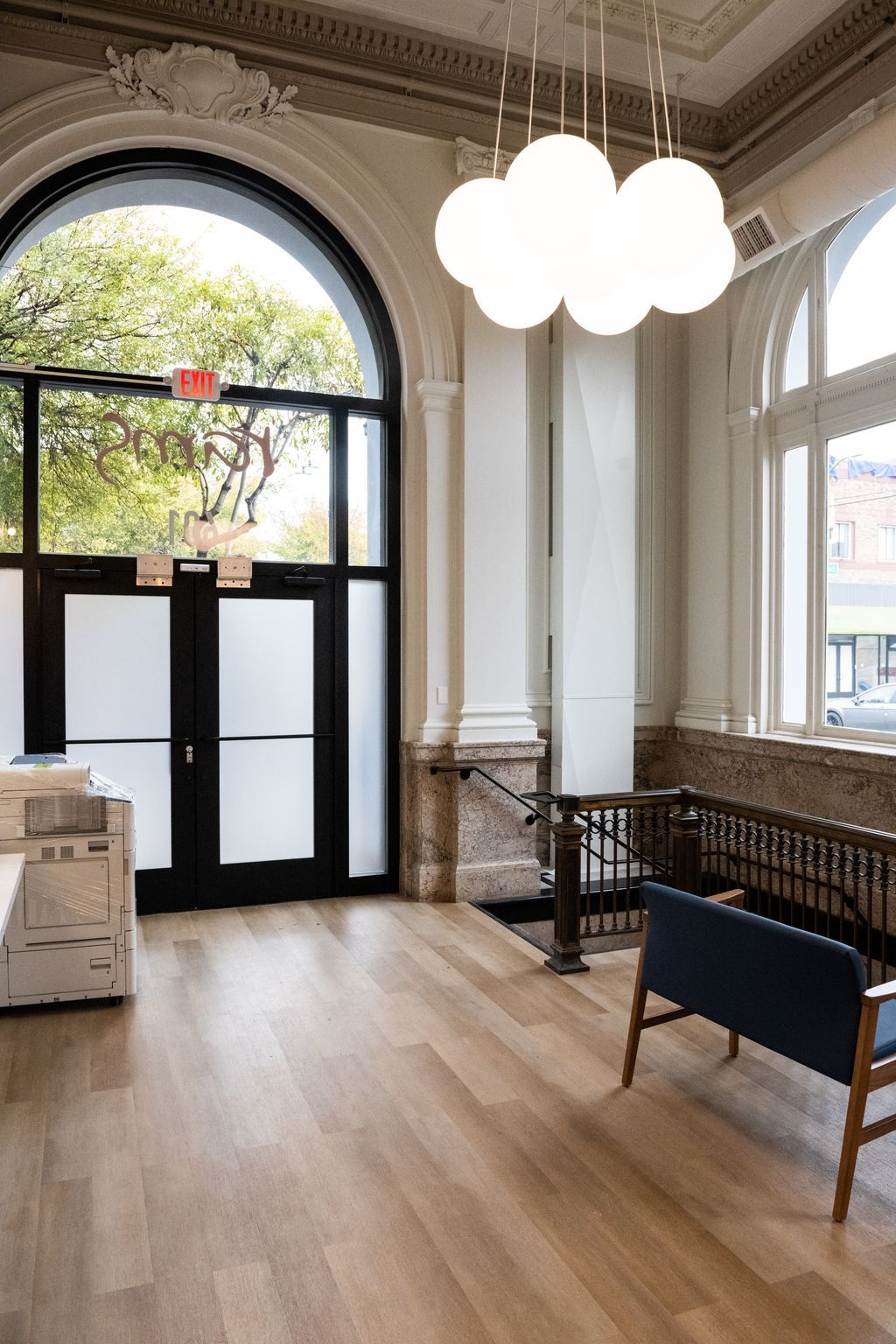 Former banking hall: arched windows, globe pendants and marble wainscot, Clement St, San Francisco