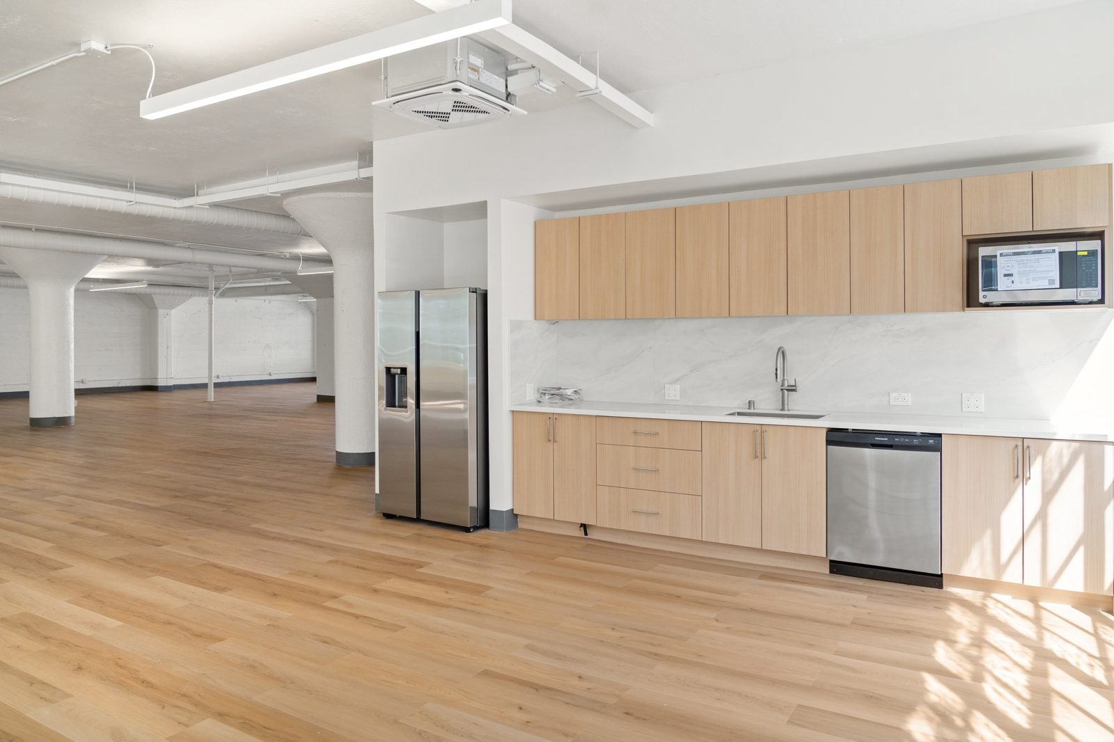 Kitchenette and open floor at Brannan St